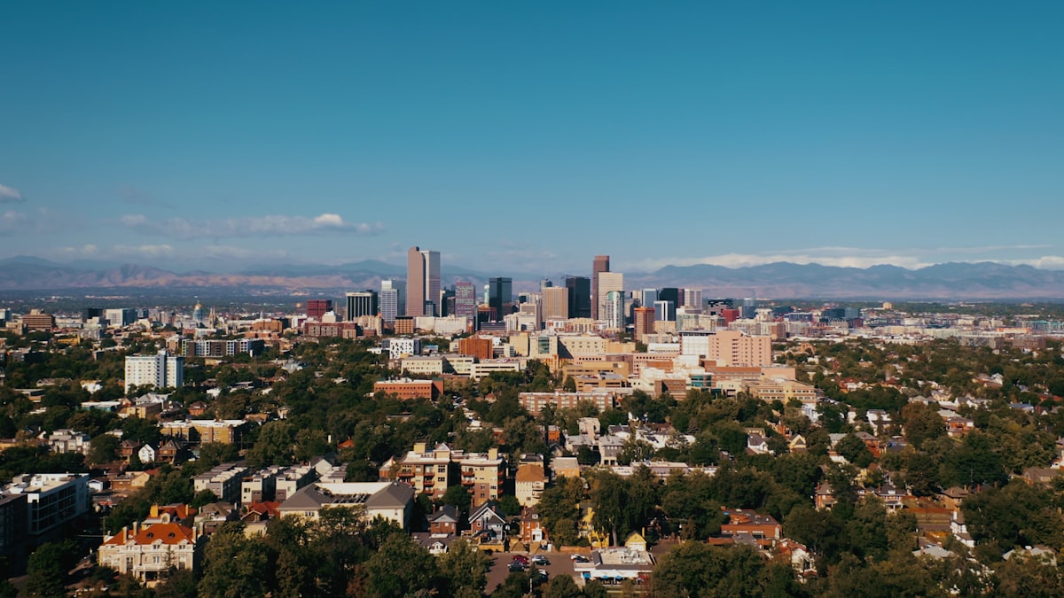 Denver Colorado with Rocky Mountains — sell your mortgage note in Colorado